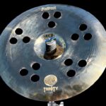 trinity 16 brilliant holey china blk bg